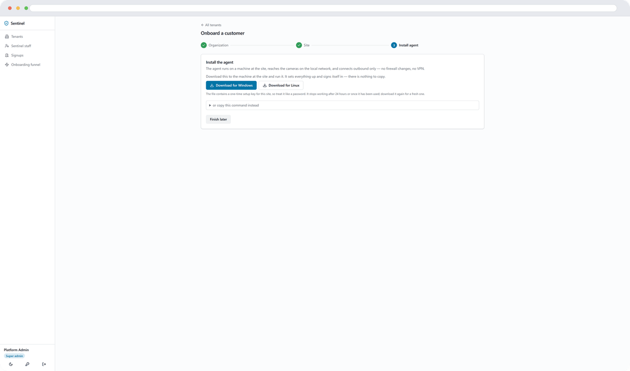The install step of the onboarding wizard, offering a Windows and a Linux installer download for this site.